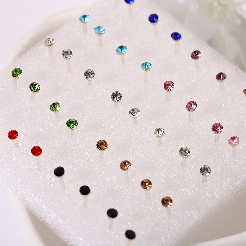 Korean-style colored resin ear studs, niche and high-end plastic earrings, fashionable rhinestone ear stud set, PDD ear bone studs Application Scenario