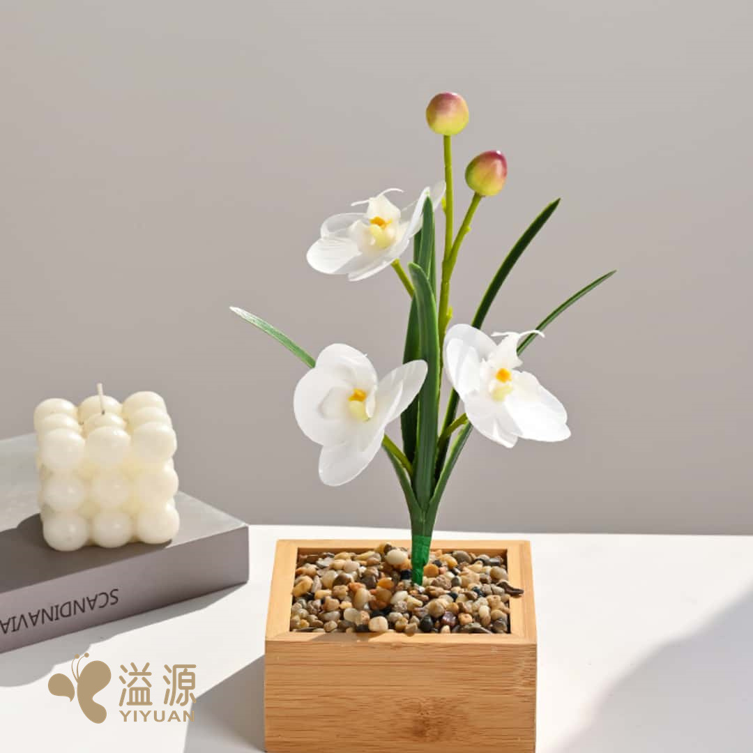 The small Phalaenopsis with leaves, three-flower hand feel, indoor home artificial flower, photography prop, wedding artificial flower and decorative plant Specification image