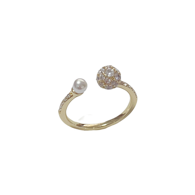 A simple and elegant round zircon pearl open-top ring with a retro and high-end look from the European and American Amazon Application Scenario
