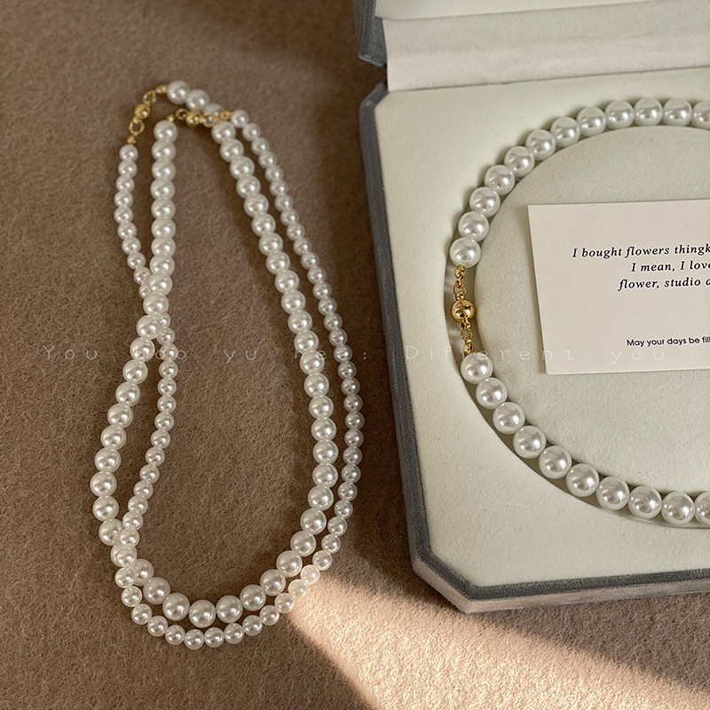 Shi Jia 'ao White magnetic clasp round pearl necklace for women, a light luxury and niche summer collarbone chain, 2024 new style accessory