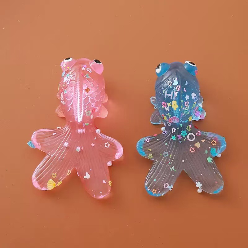 Cross-border creative epoxy resin children's relaxing and cute little goldfish toy Creative cross-border details Picture