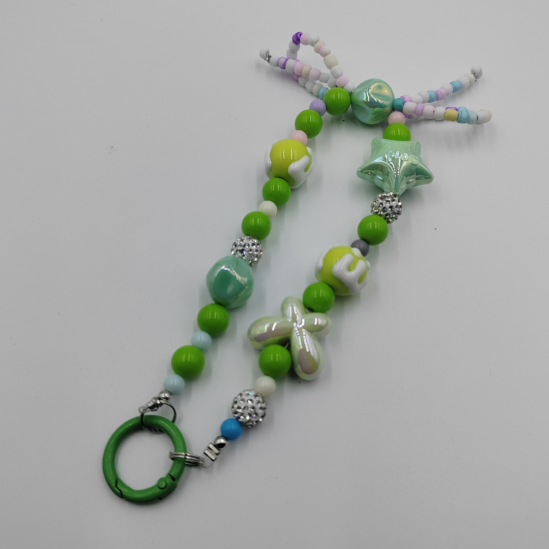 Factory direct supply of candy-colored hand-painted bracelets, new diamond balls, beaded keychains, car hangers, bows, and mobile phone pendants details Picture