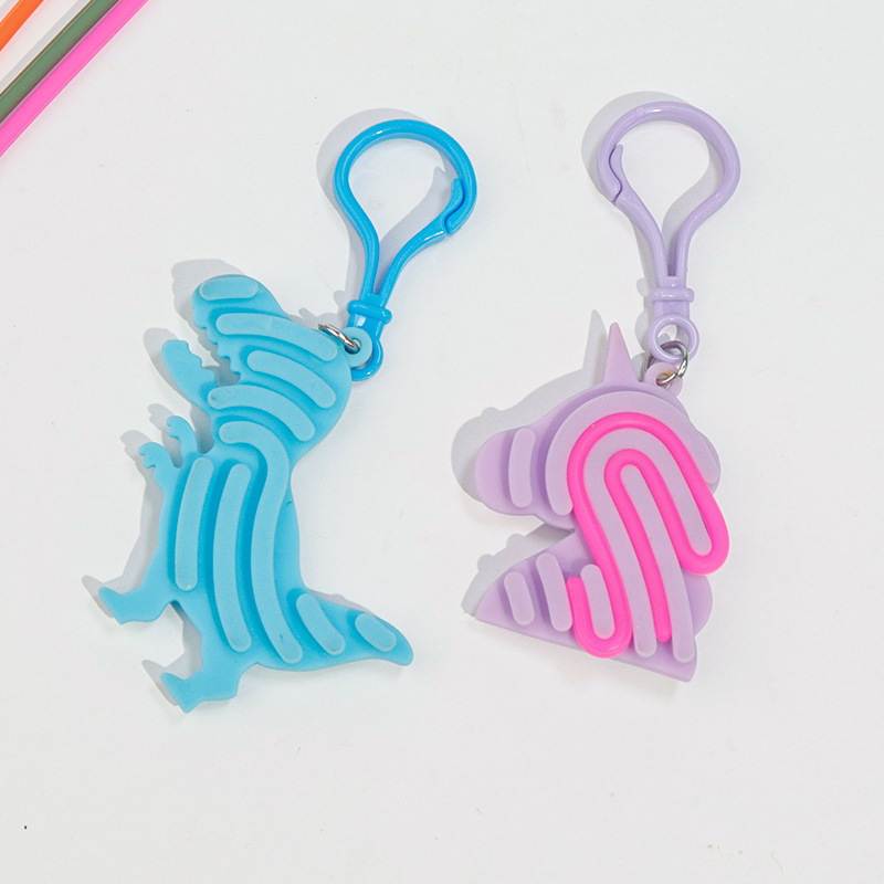 Silicone stress-relieving sensory mini keychain pendants, cartoon dinosaur figurines, schoolbag pendants, small gifts wholesale details Picture