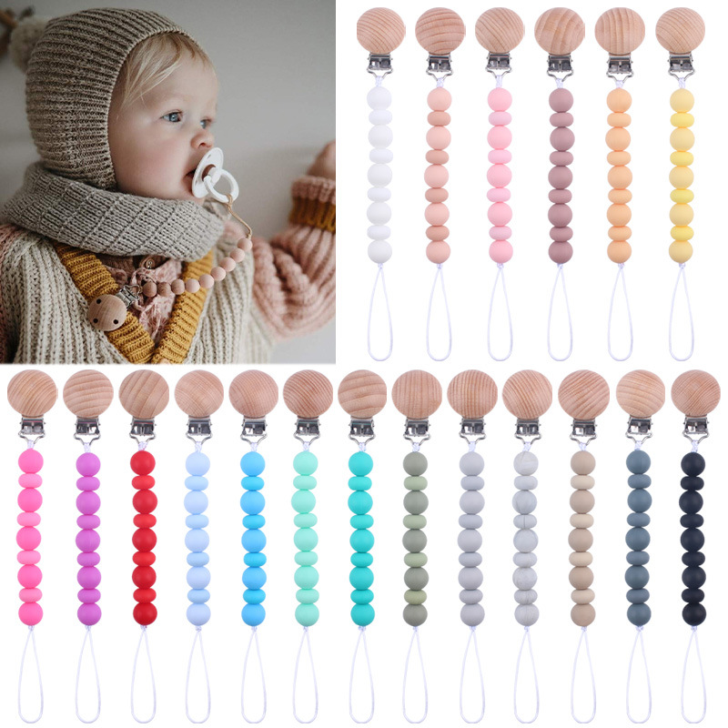 新款婴幼儿用品榉木奶嘴夹安抚宝宝硅胶珠扁珠咬咬奶嘴链防掉绳