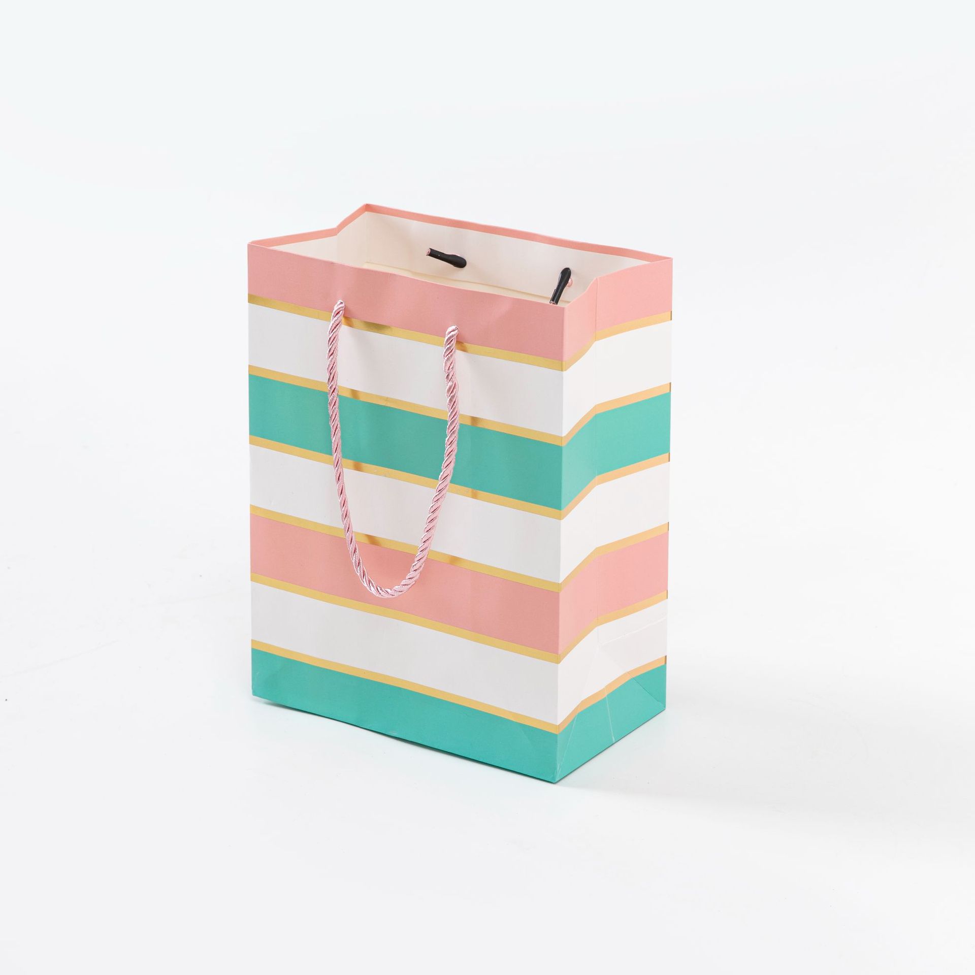 Irregular horizontal striped polka dot paper bags, white card gilding creative gift bags, supermarket gift shops, wholesale packaging for foreign trade in stock, souvenirs Application Scenario