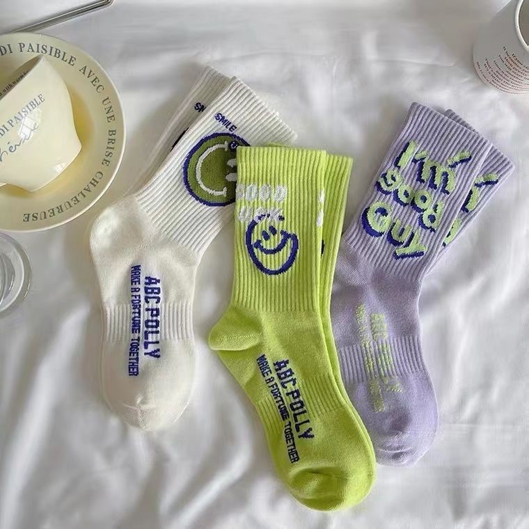 Spring and autumn socks, smiling face three-dimensional fluorescent green ins trendy long socks, men's and women's colorful versatile school mid-calf socks details Picture