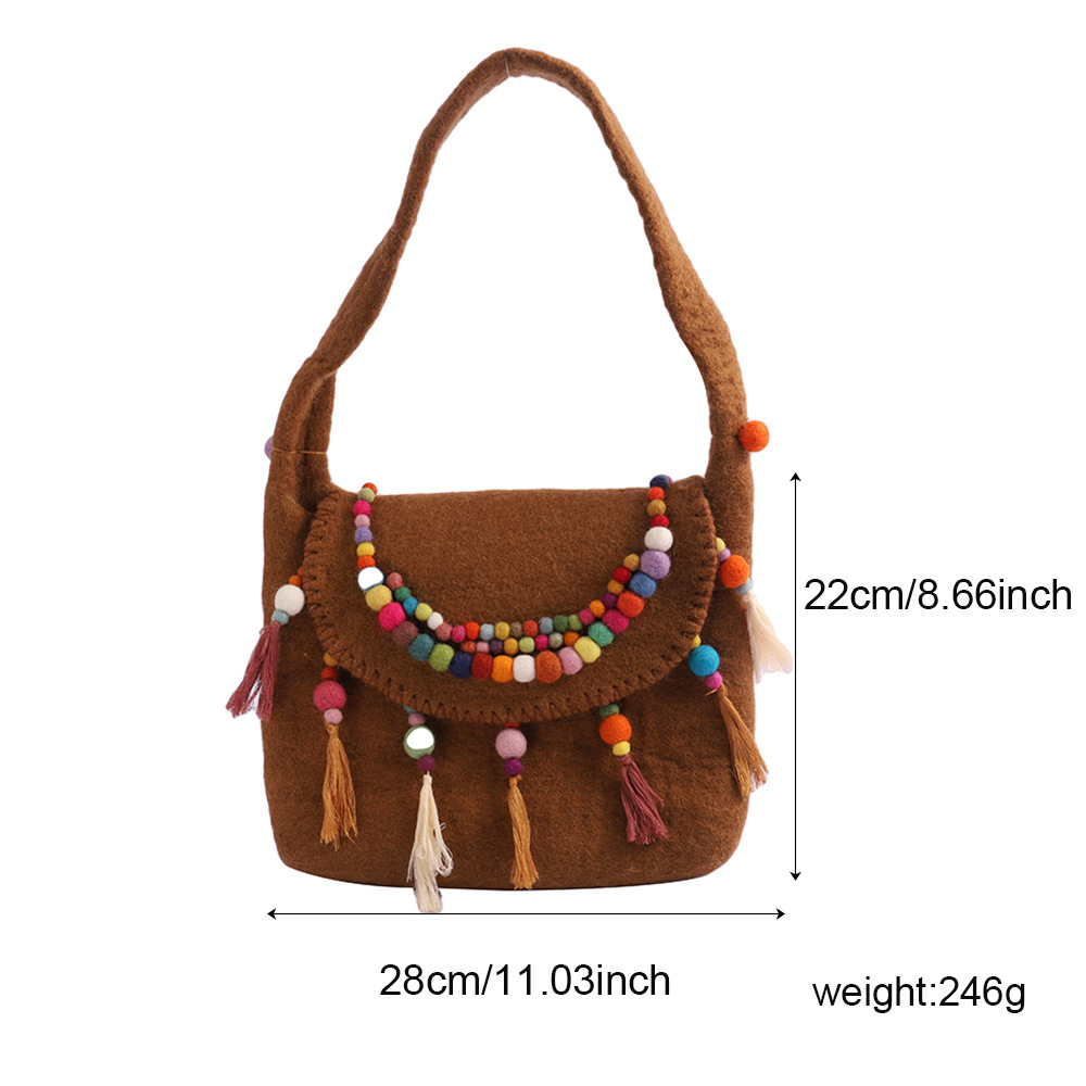 民族风羊毛毡挎包尼泊尔手工羊毛毡包包精致羊毛毡手拿包厂家直销白底实物图