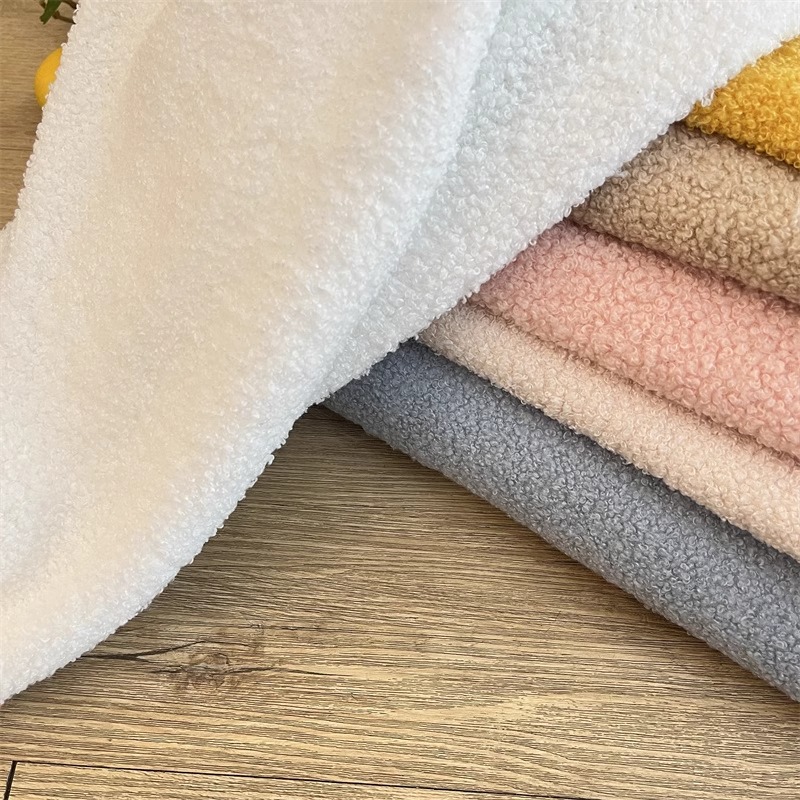 泰迪绒面料加厚涤纶颗粒绒毛绒玩具毛圈绒布料服装宠物用品布料厂产品图