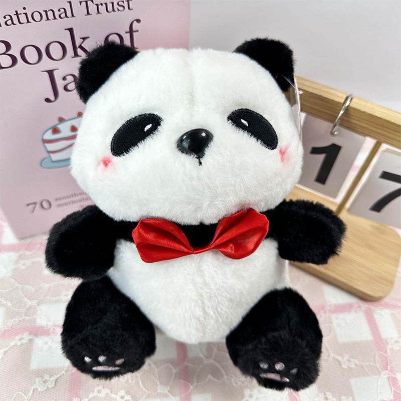 Wholesale of cute panda plush toys, simulated giant panda dolls, tourist souvenirs, 30cm claw machine dolls details Picture