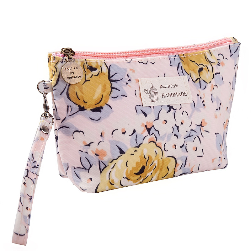 Factory direct sales waterproof fabric cosmetic storage bags with printed patterns for ladies to carry together waterproof travel toiletries Item Picture