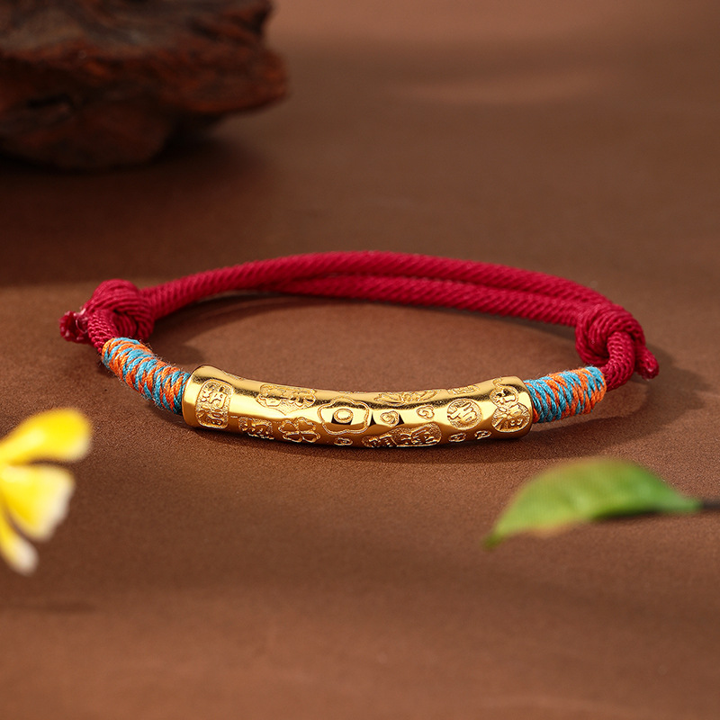 The red string bracelet is creatively woven for peace and joy. It is a copper gold-plated six-character mantra with auspicious words and a red sand Chinese style details Picture