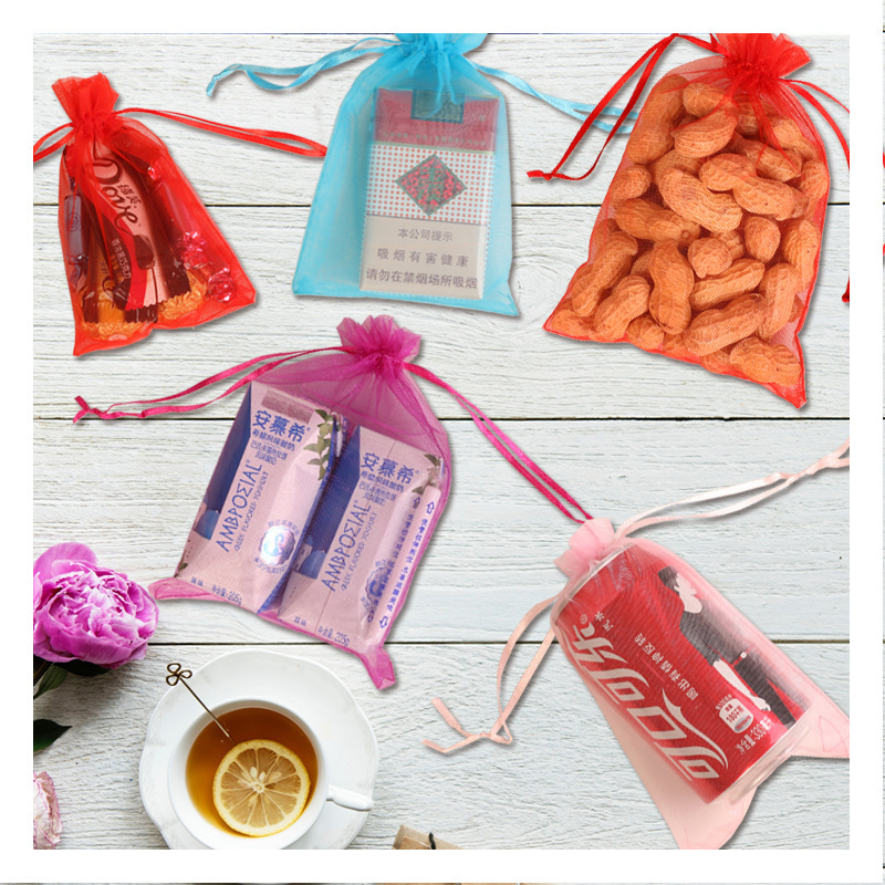 Transparent net solid color large storage bag, wedding candy bag, drawstring silk bag, pull-out creative small snow yarn drawstring bag Application Scenario