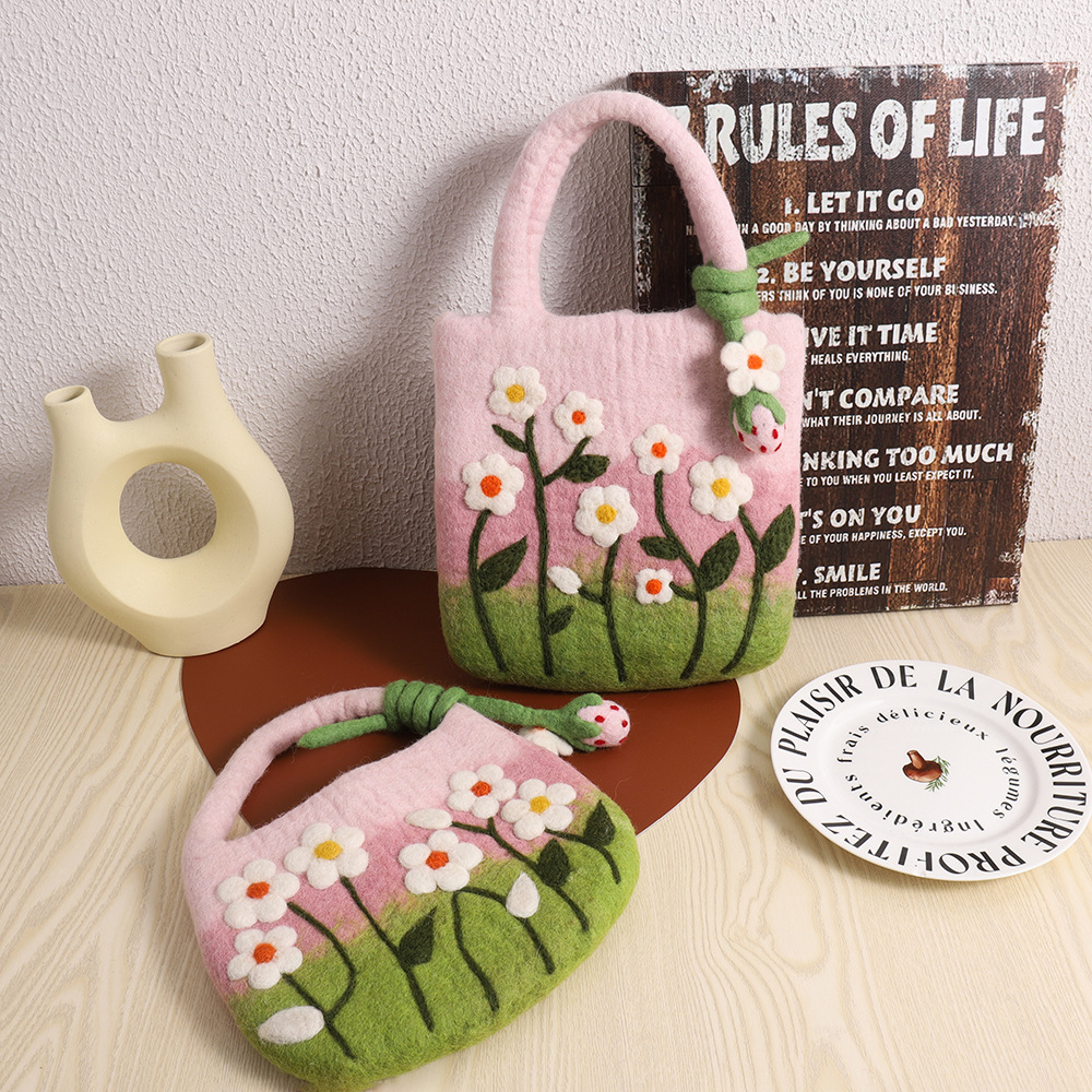 Wholesale of Japanese-style floral wool felt bags, Nepalese handcrafted wool felt clutch bags, and forest-style wool felt handbags