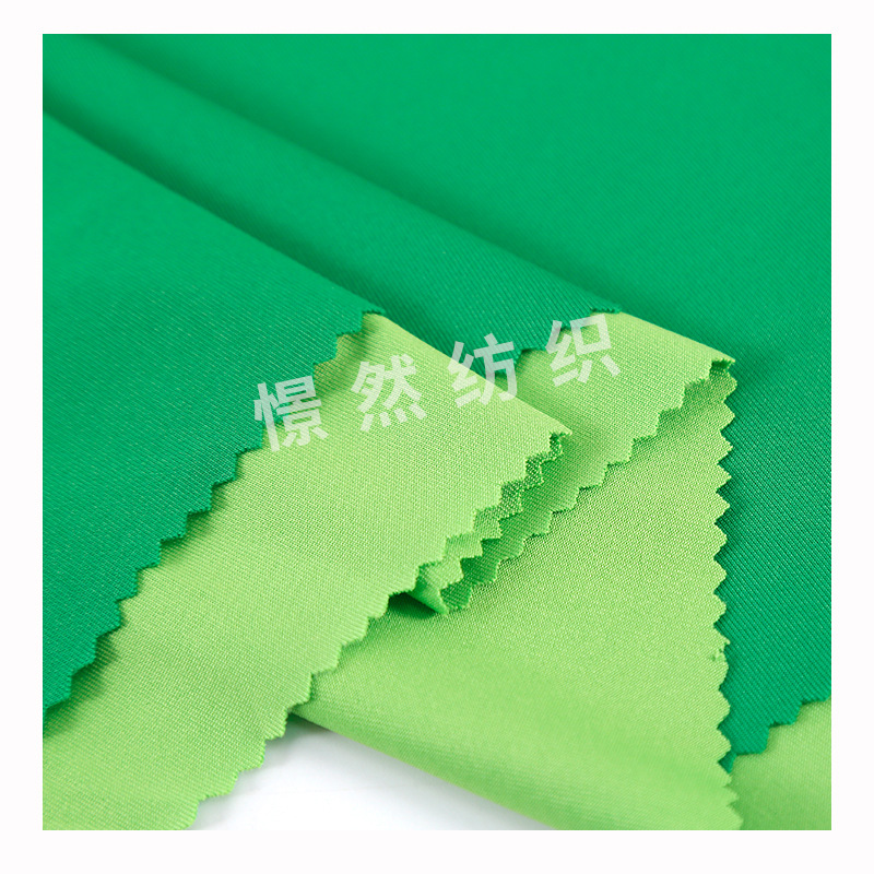 100D牛奶丝拉架四面弹力布180克涤氨汗布速干T恤运动服复合里布白底实物图