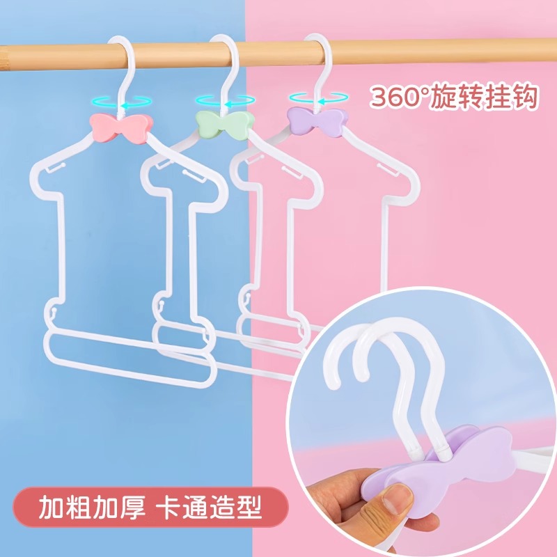 Mother and baby bow set, one-piece children's rotatable hook plastic clothes and pants hanger, thickened one-piece hanger for children's clothing store details Picture