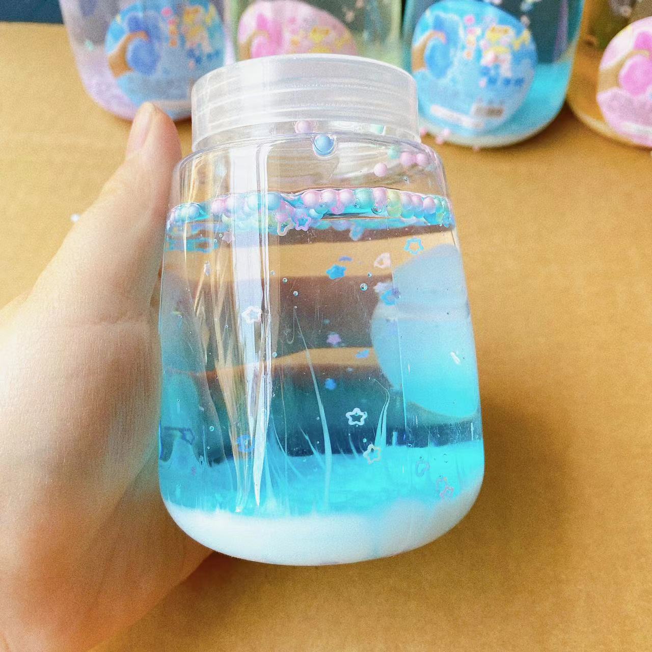 儿童玩具彩泥水晶泥起泡胶高透大瓶圆瓶史莱姆云朵泥高颜值套圈批产品图