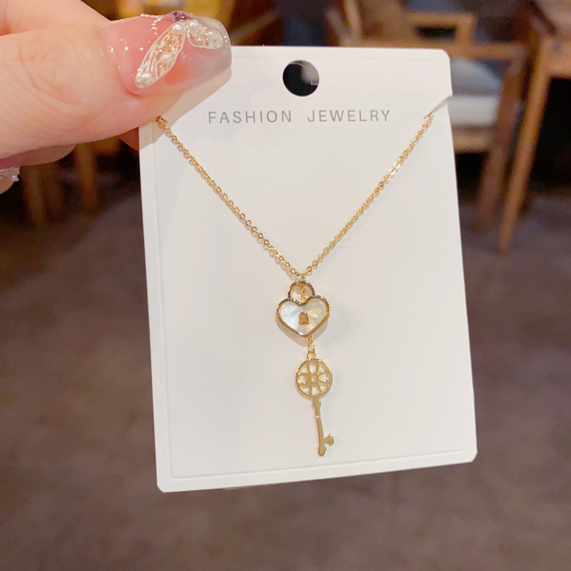 Korean style, fashionable design sense, heart lock, key, tassel pendant necklace, unique, light luxury, versatile collarbone chain for women Specification image