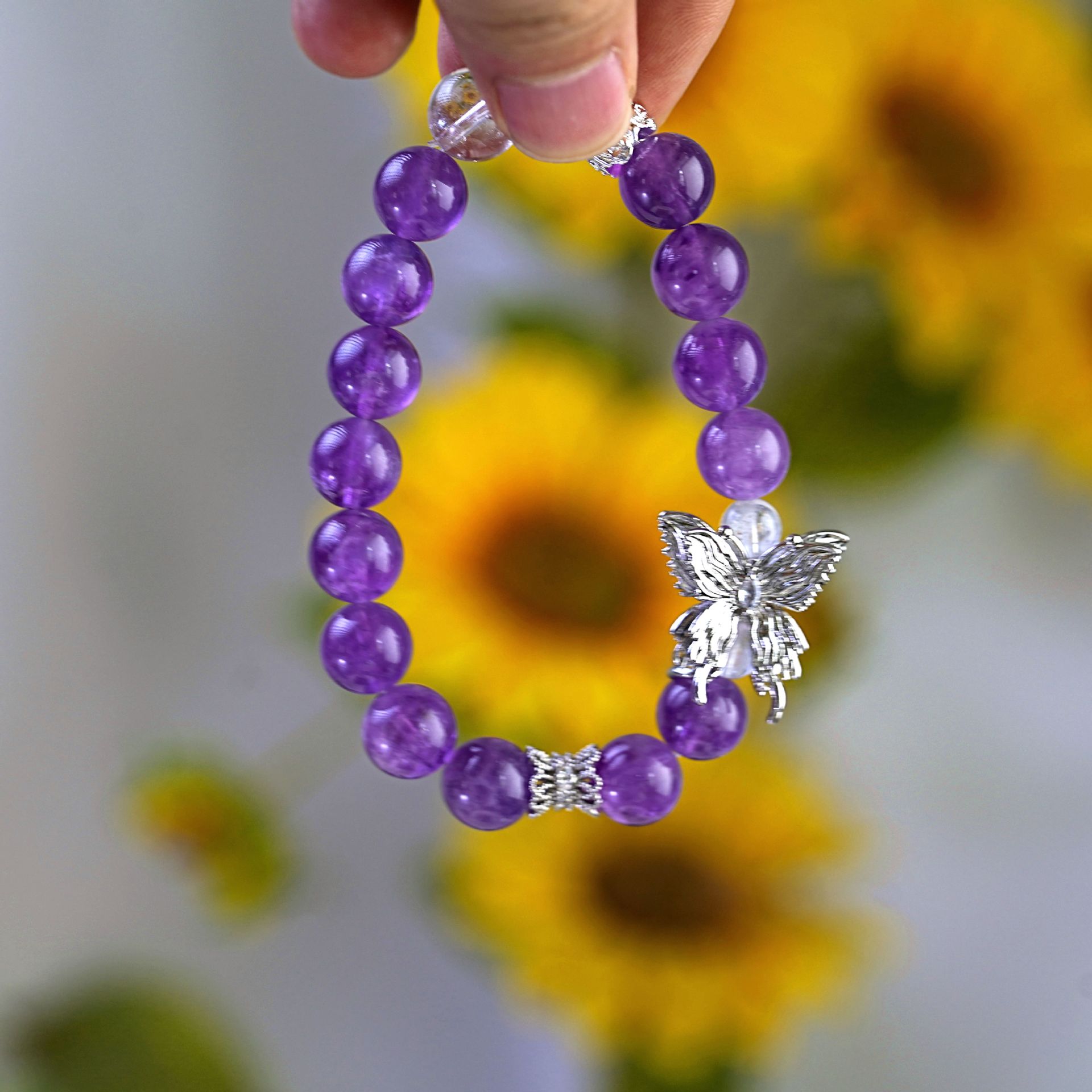 Natural amethyst butterfly bracelet with beaded beads, a light luxury and high-end fashion design. White crystal bracelet as a women's accessory details Picture