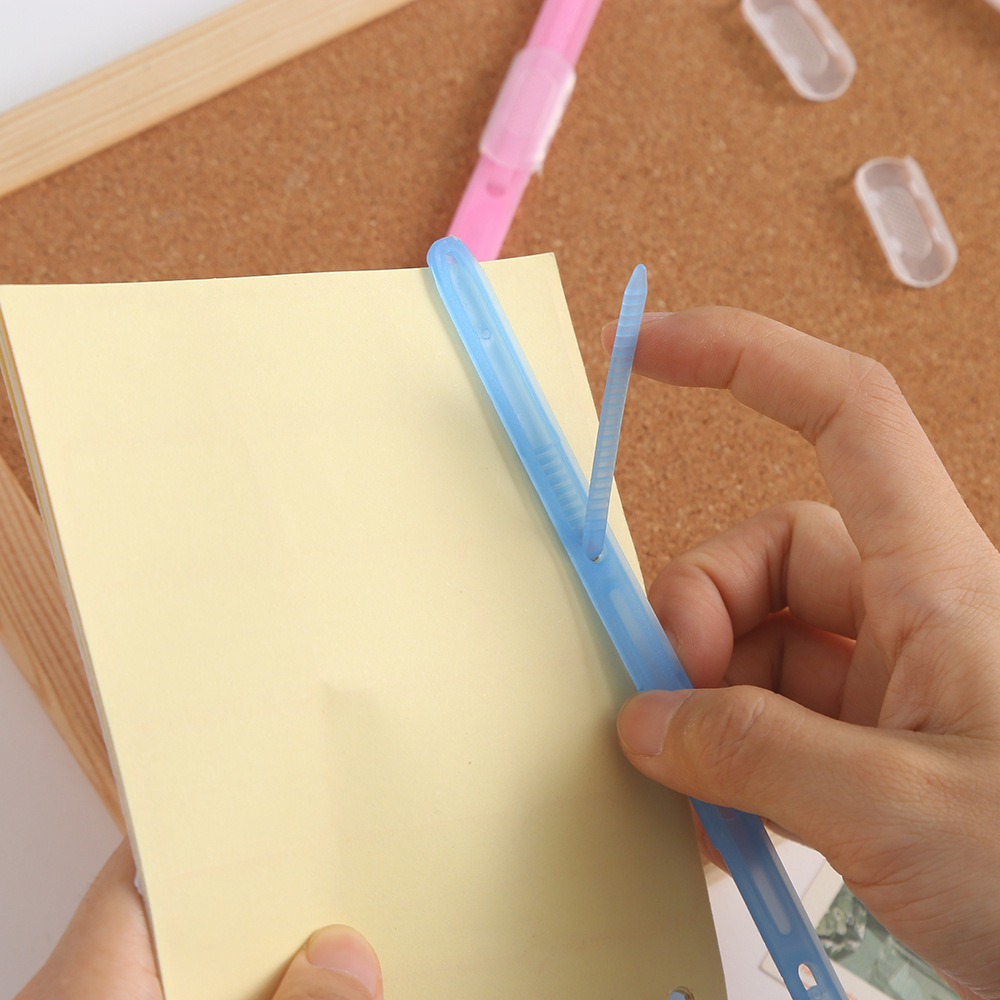 Factory double-hole file folders, student office test paper materials binding clips, punched materials binding clips wholesale Application Scenario