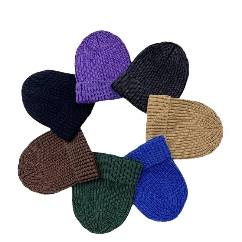 New solid-color, versatile woolen cap for autumn and winter, a fashionable cold cap for European and American export, warm, high-quality, rolled-up, trendy knitted cap Item Picture
