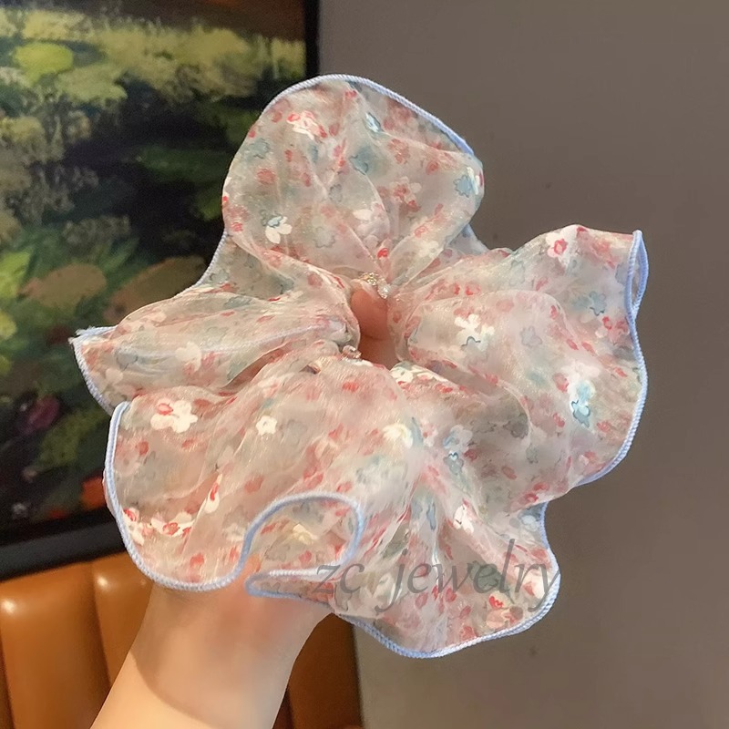 Korean sweet floral large intestine hair band, a fashionable hair tie for women to go out in summer, an Instagram influencer's high appearance level hair band and hair accessory details Picture