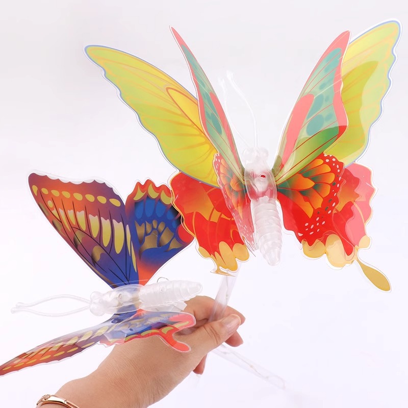 Douyin products' new seven-color glowing butterfly handheld flashing wings are available for children's toys at the square night market and street stalls Application Scenario