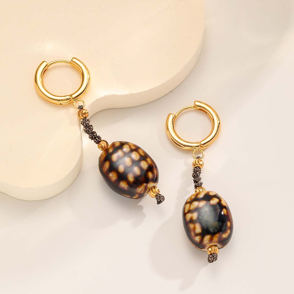 Nasha's cross-border Maillard ceramic earrings, circular ear buckles and earrings, are simple, fashionable, artistic and retro accessories for women Specification image