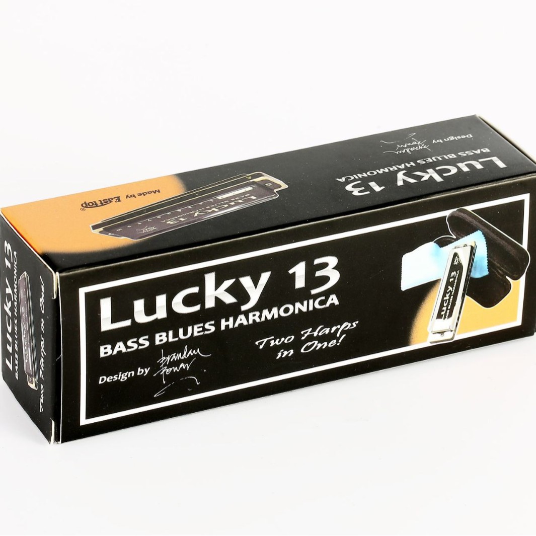 口风琴/乐器/足球/儿童玩具/小号乐器白底实物图