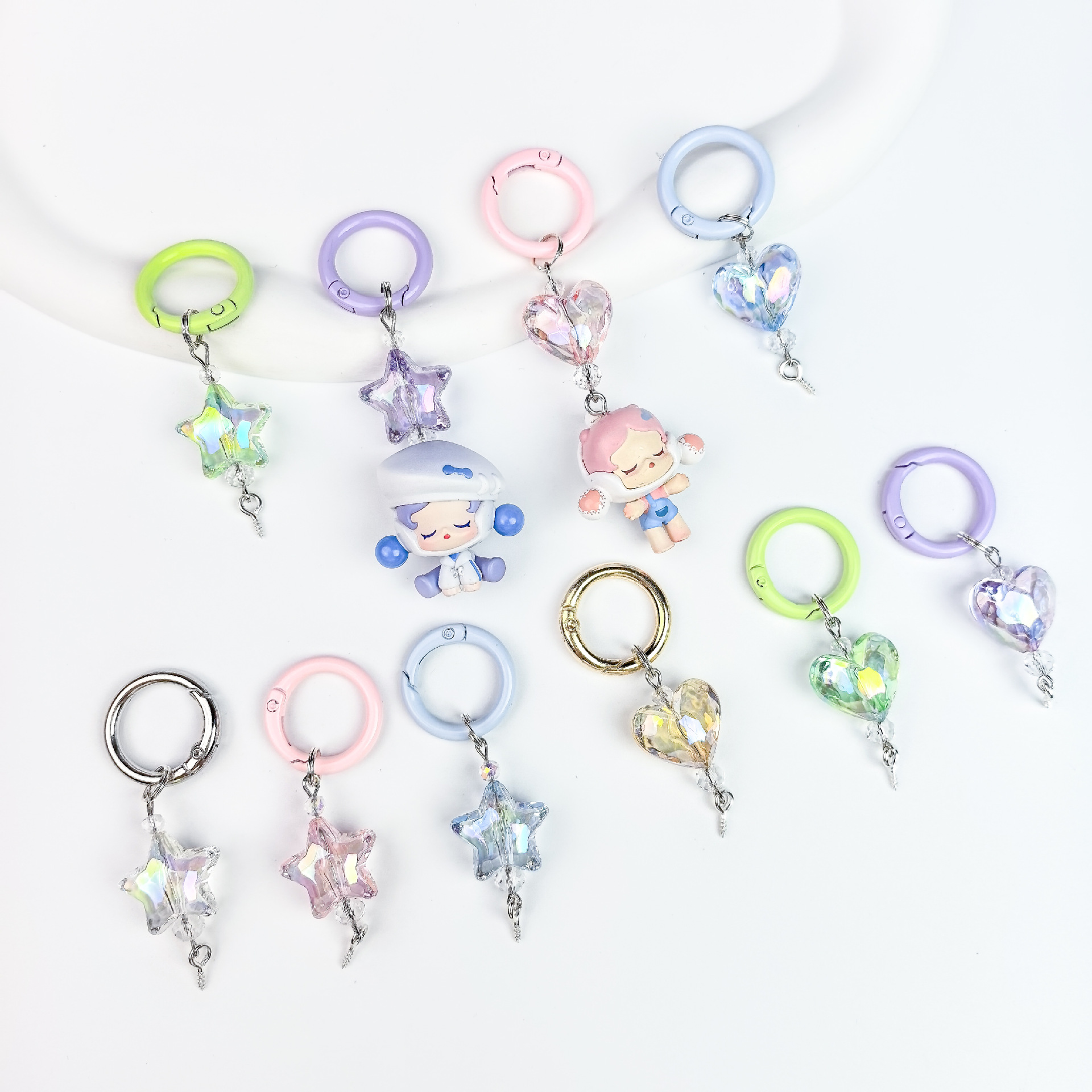 New Uv Transparent Heart-Shaped Star Multi-Color Keychain, Sheep Horn Nail, Cute Particle Blind Box, Diy Pendant, Mobile Phone Hanger Wholesale