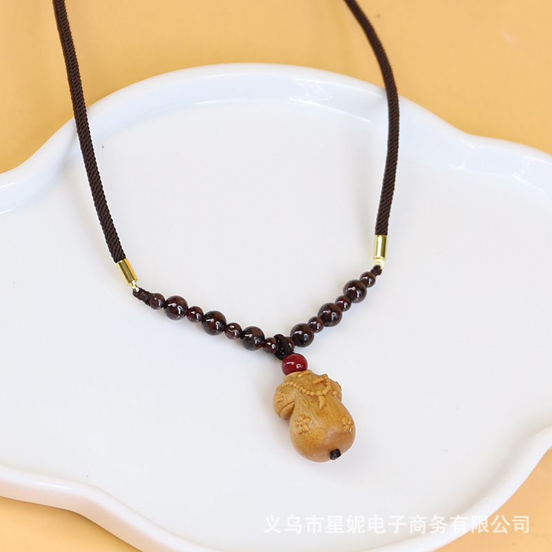 Wooden carved pendant with wooden box, luminous base, detachable gourd, wooden boat, wooden bead decoration Item Picture