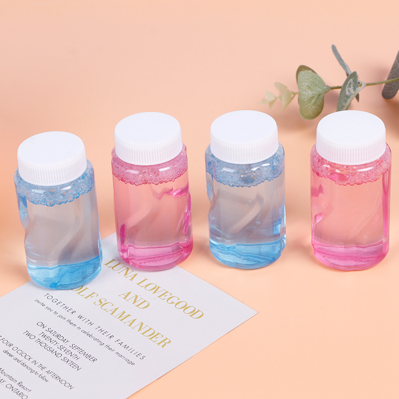 The small bottle replacement bottle inside the bubble machine, the popular bubble water bottle filled with bubble replenishment liquid, blowing bubble water, Bai Sui Shan details Picture