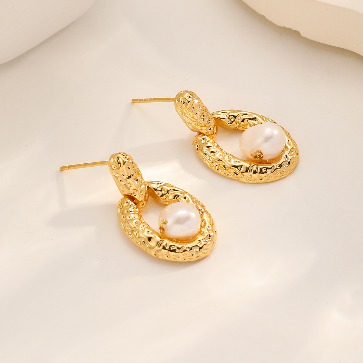 Nasha Cross-border Exclusive InS-style hollowed-out heart freshwater pearl earrings, irregular texture oval geometric earrings Application Scenario