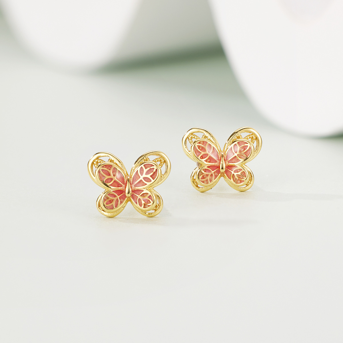Enamel butterfly stud earrings for women, artistic and retro court-style hollowed-out earrings, new Chinese-style women's earrings