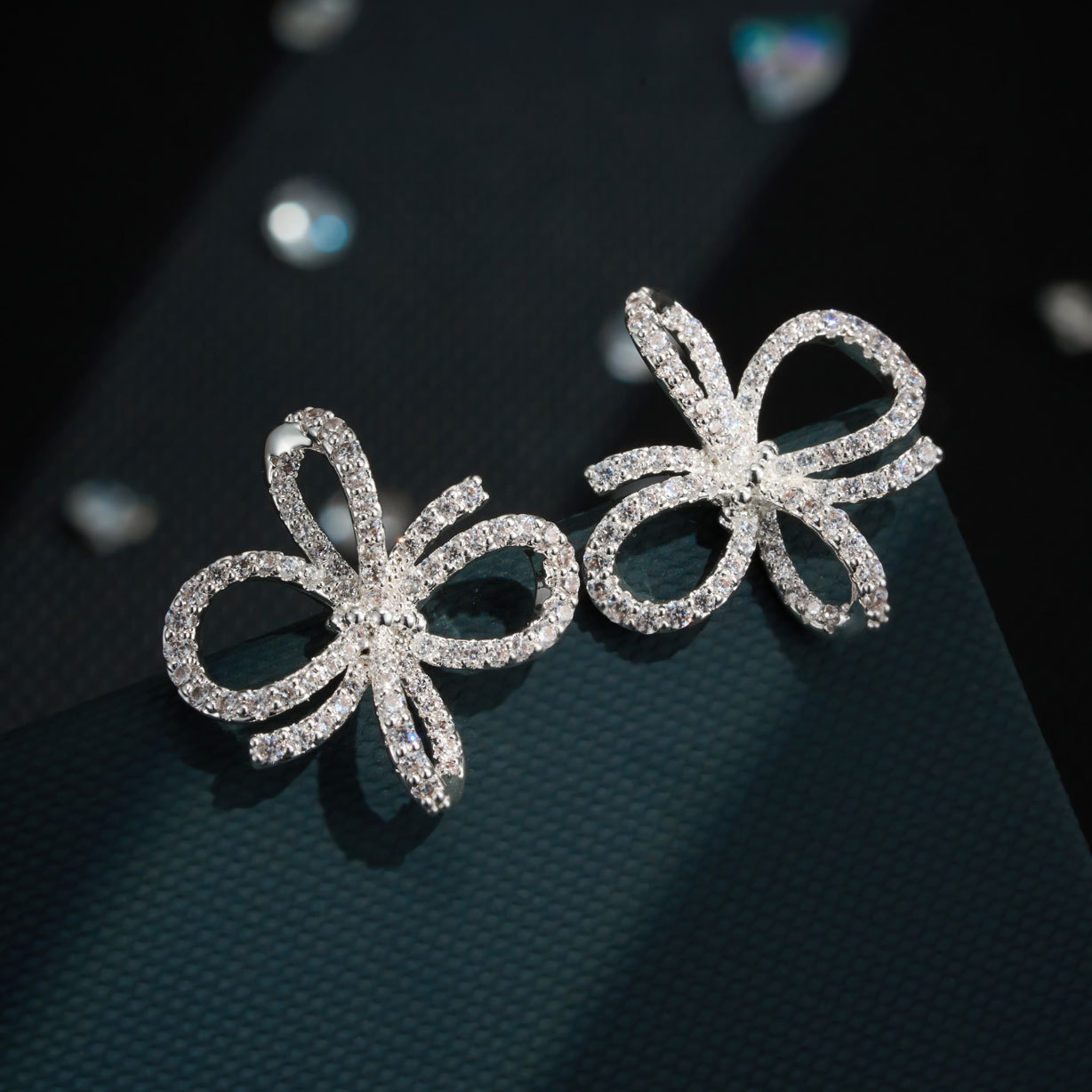 Heavy industry three-dimensional double-layer bow stud earrings, copper alloy, real gold electroplated, slightly inlaid zircon s925 silver needle light luxury earrings Application Scenario