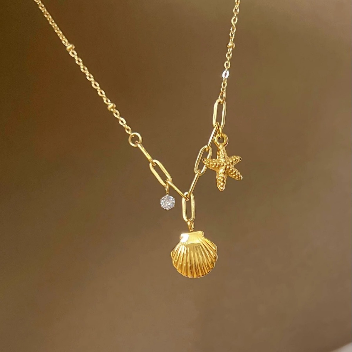 Titanium steel non-fading starfish shell pendant necklace for women, gold, niche, light luxury and high-end feel, new stainless steel collarbone chain