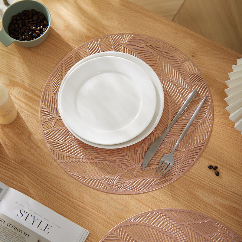 Light luxury round creative leaf hollowed-out gold-embossed silver leaf table heat insulation pad, cross-border pot pad, PVC injection molded heat-resistant Light luxury round creative leaf hollowed-out gold-embossed silver leaf table heat insulation pad, cross-border pot pad, PVC injection molded heat-resistant
