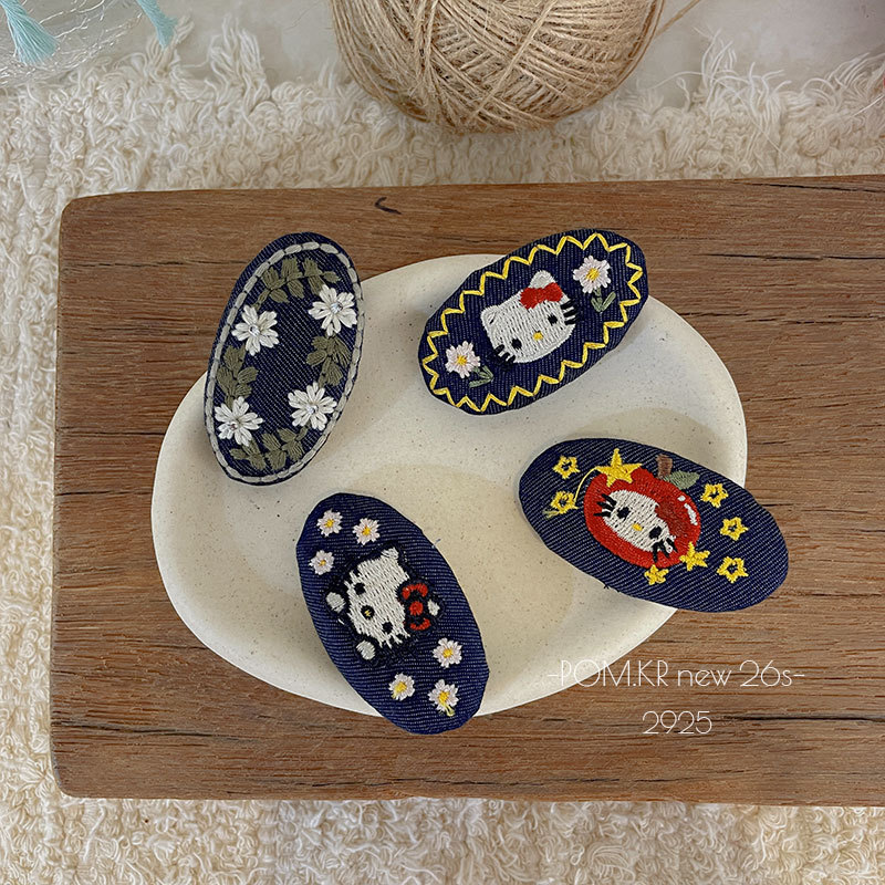 New Korean-style oval denim embroidered kt hair clip, children's fabric handmade bye-bye clip, sweet and versatile side clip hair accessory Application Scenario