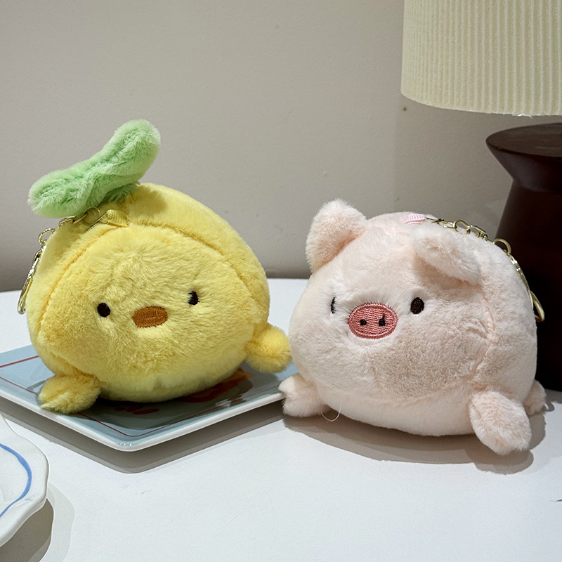 The little cat doll that wags its tail by pulling a rope is called the popular little white rabbit plush toy backpack doll at the street stall Application Scenario