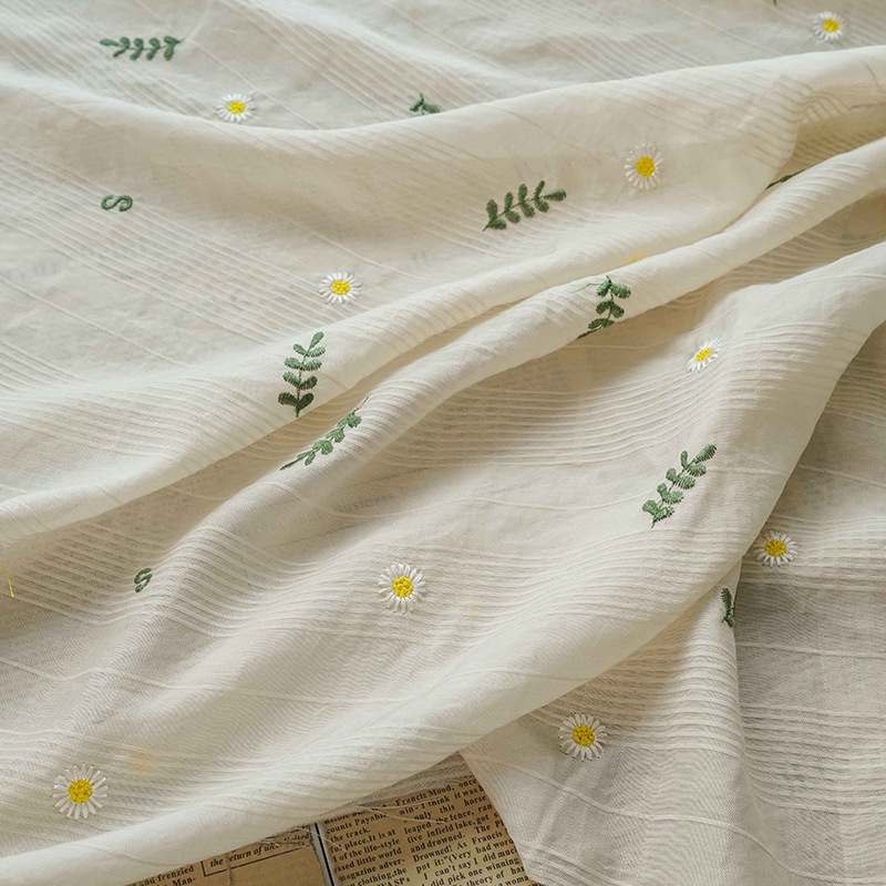 Fresh and soft shirt, spring and summer embroidered dress fabric, small Daisy character mother skin small halter decorative fabric Application Scenario