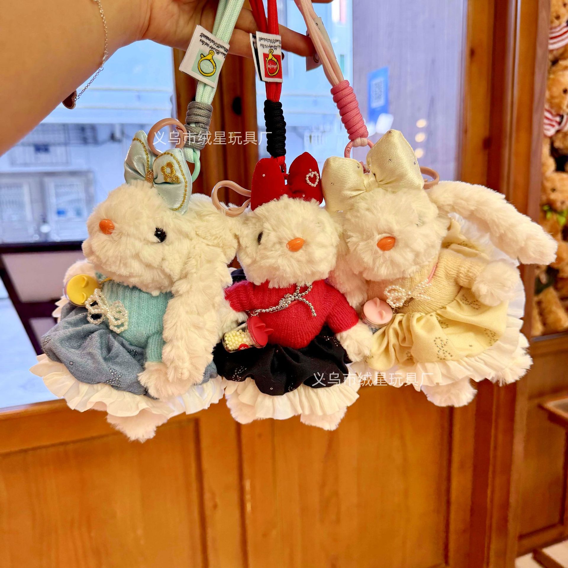 New plush plush phone pendant with drooping ears, creative outfit. Long-eared rabbit bag hanging car keychain factory direct sales full figure