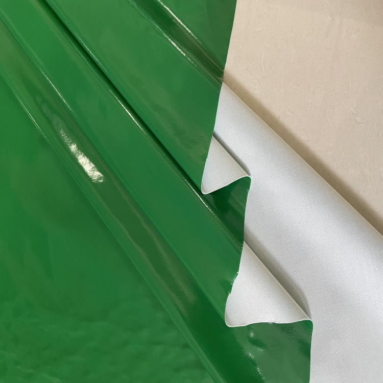 PU镜面皮革双开布0.4mm箱包玩具人造合成面料半PU亮面镜面亮皮