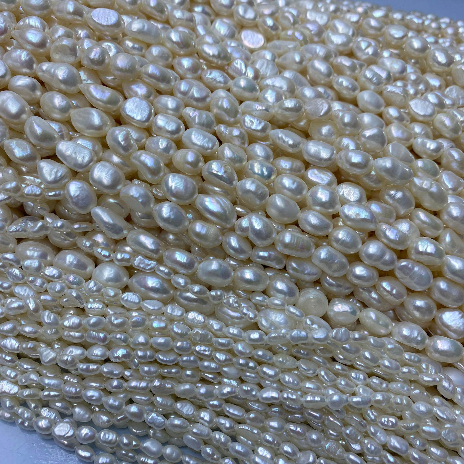 Natural freshwater pearls 2-9mm, Baroque irregular-shaped two-sided smooth straight-hole pearls, irregular stone accessories, loose pearls Application Scenario