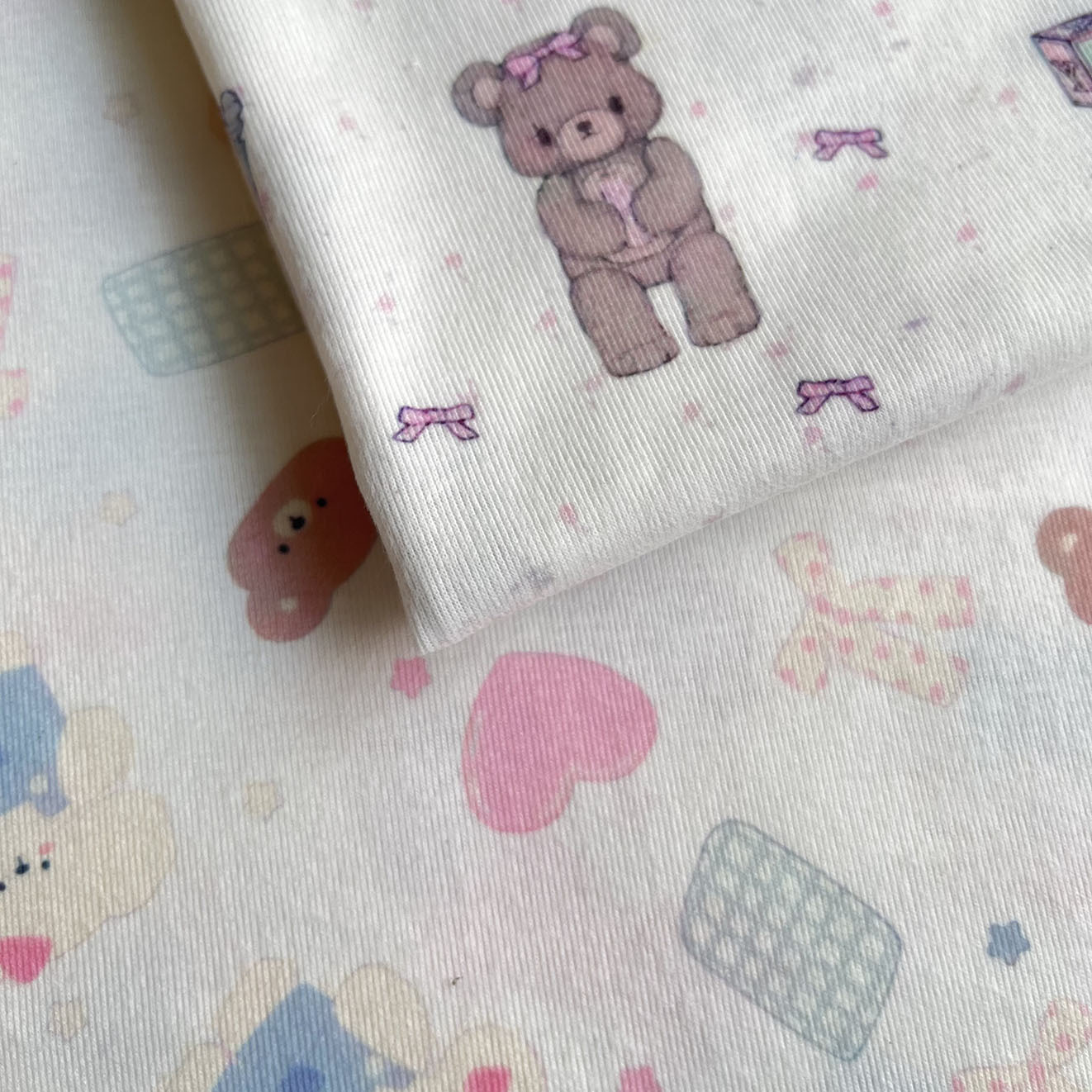 春夏时尚新品男女宝宝套装上衣可爱卡通印花弹力针织磨毛坑条面料细节图