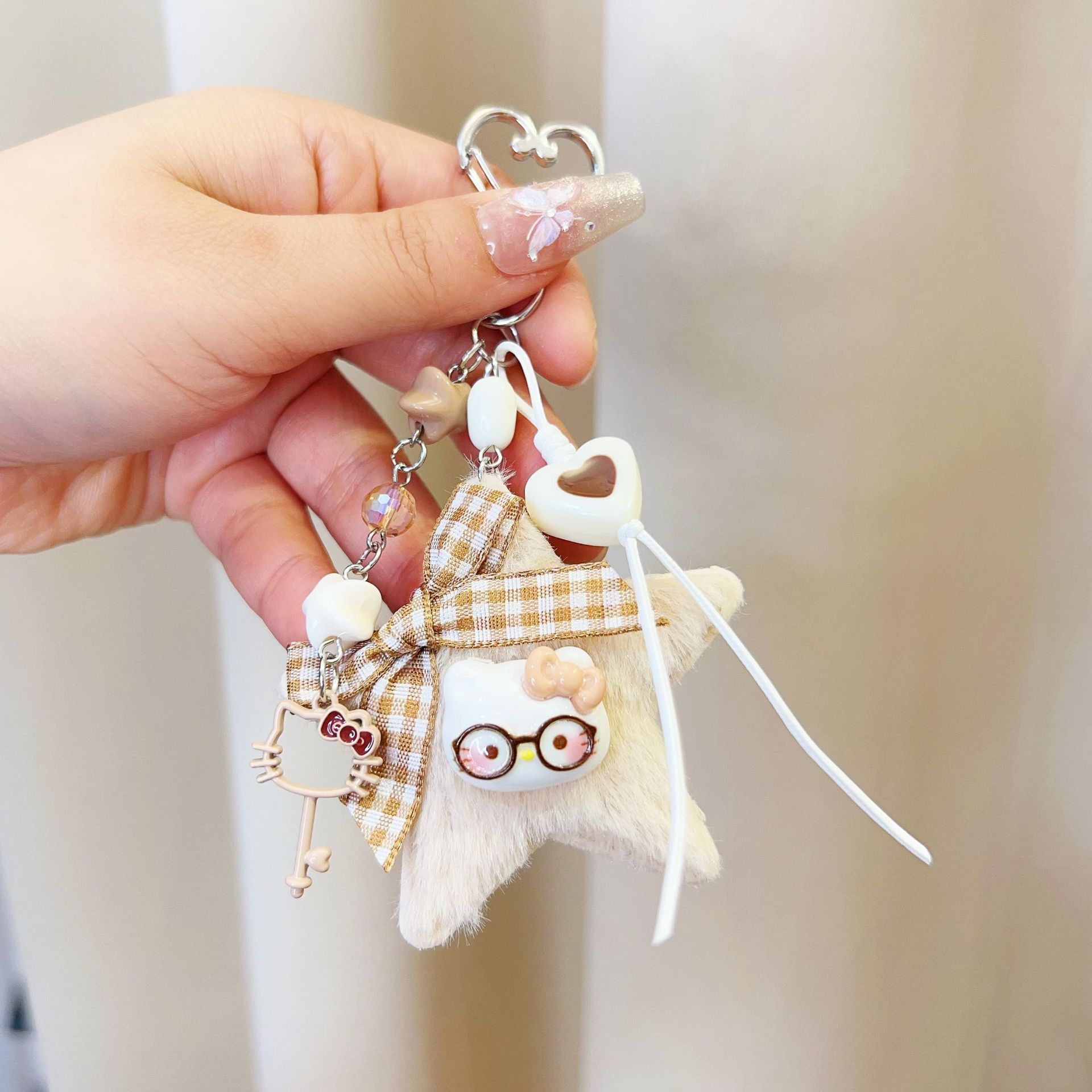 原创新款卡通五角星包挂咖色系猫咪钥匙扣百搭手工编织包挂件批发产品图