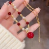 This autumn and winter new style of fashionable and retro beaded red pearl pendant necklace is unique, light luxury, gentle and versatile. It's a collarbone chain for women details Picture