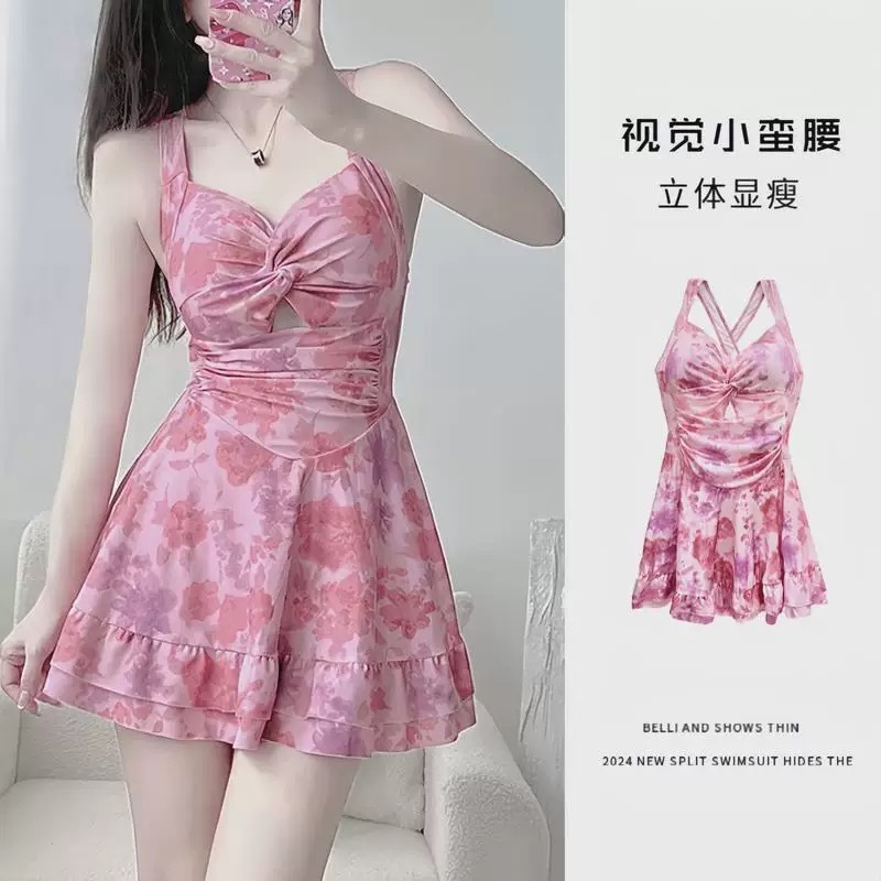 A women's one-piece halter dress with a fashionable print is a conservative, slimming, and backless swimsuit for a hot spring vacation full figure