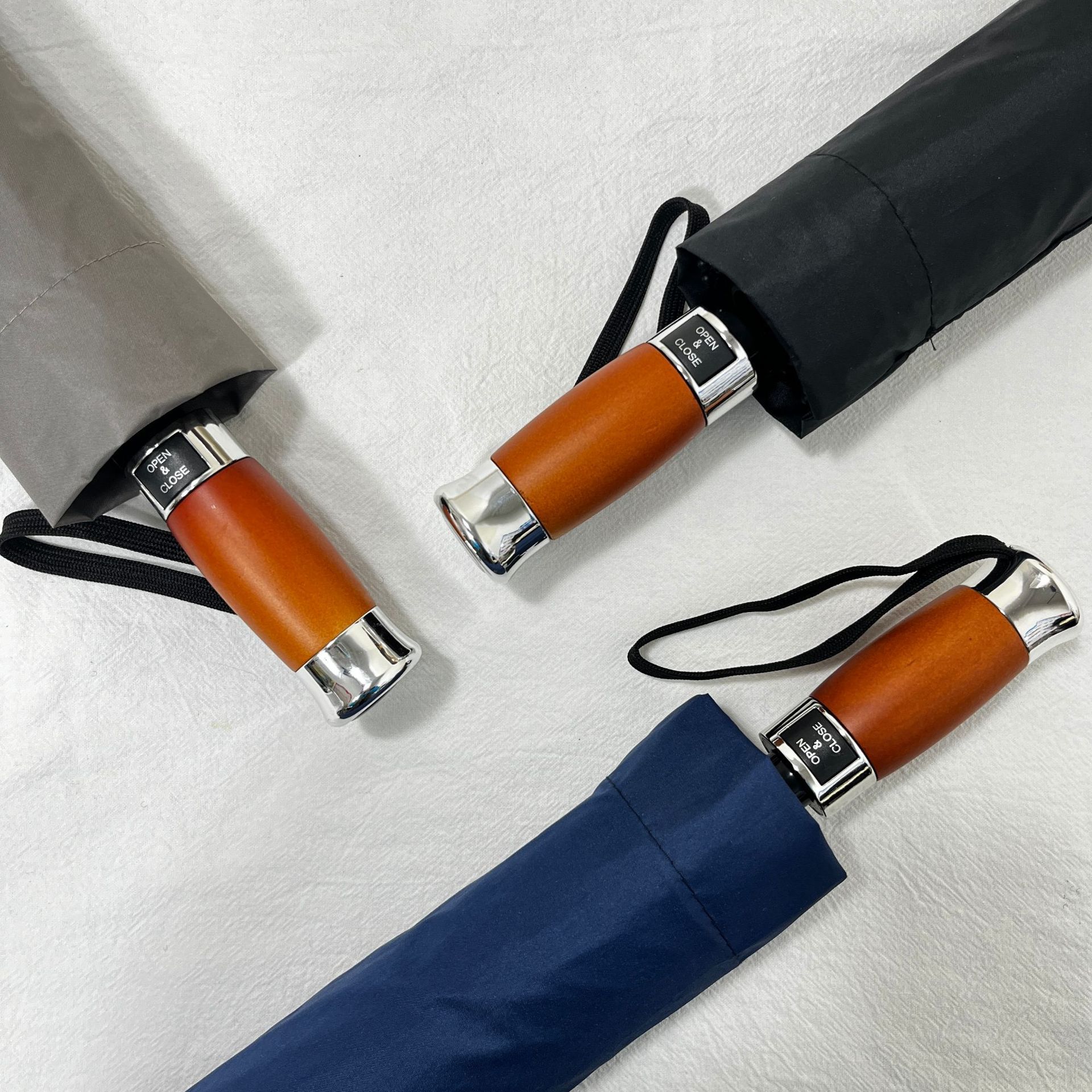 Fully automatic large wooden handle business umbrella, thickened and enlarged men's all-weather sunshade umbrella, folding umbrella