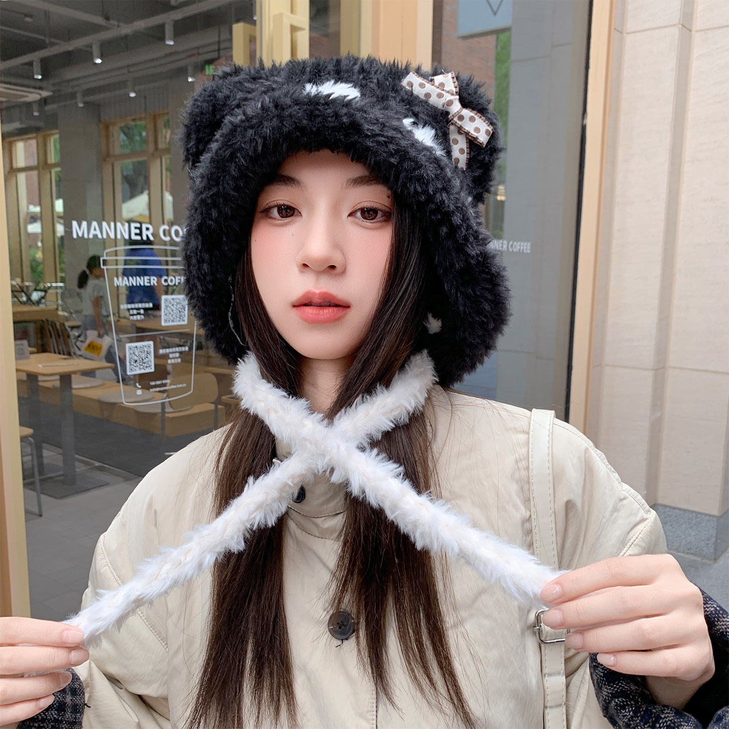 The 2025 new style of bear ear bow plush hat for women's season shows off the face. It's a small ear-protecting Lei Feng hat that keeps the ears warm Specification image