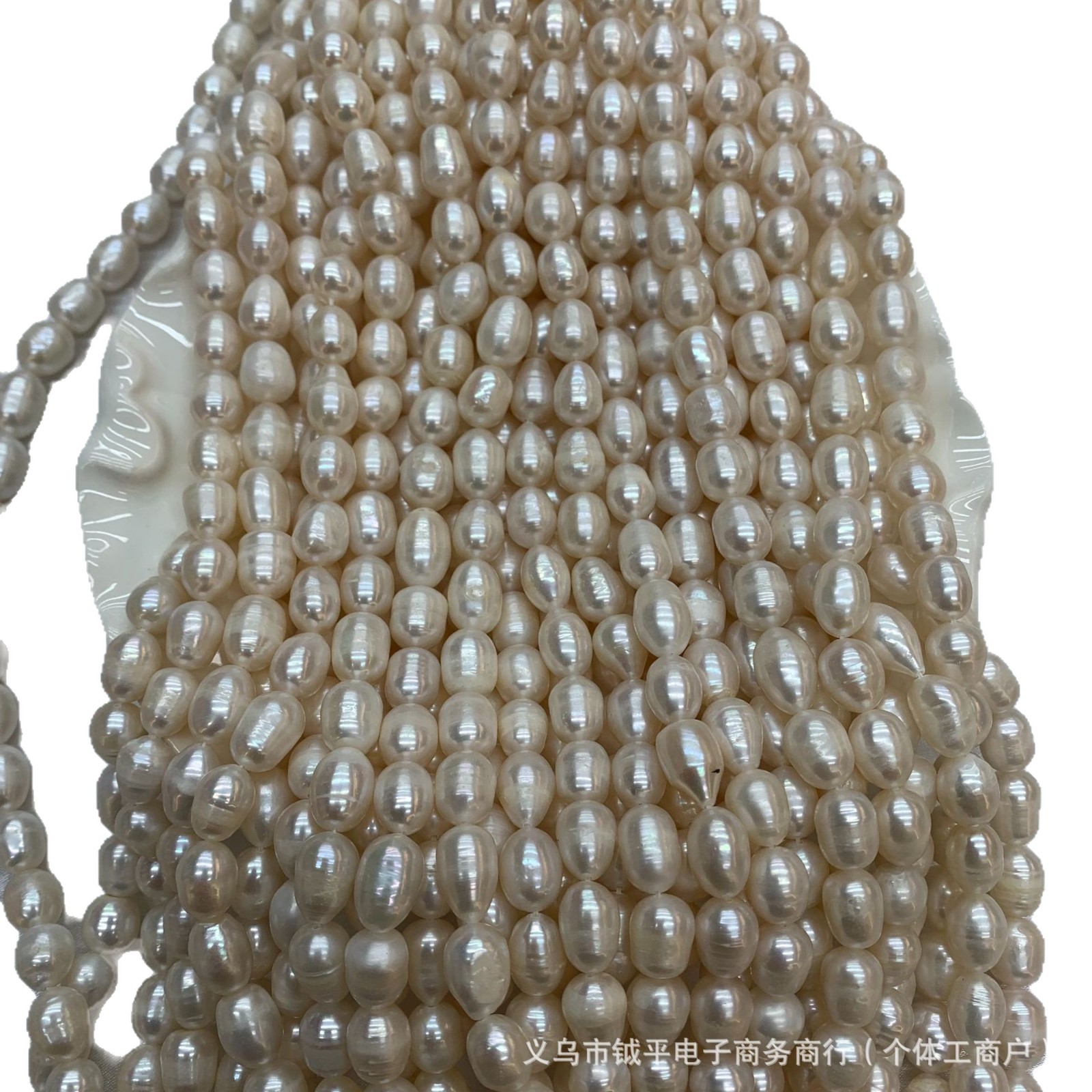 9-10mm米白色天然淡水珍珠半成品白底实物图