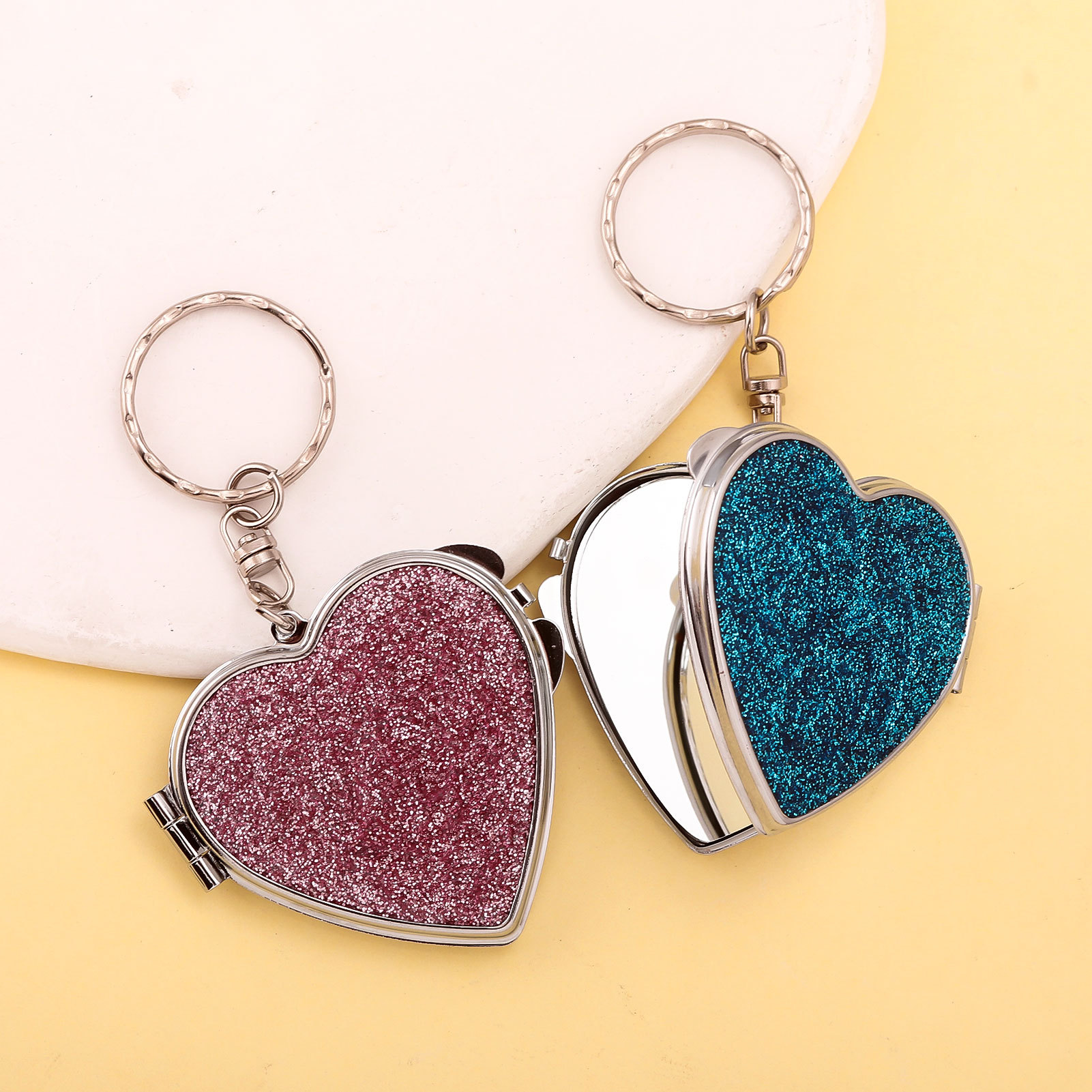 跨境热销迷你化妆镜钥匙扣 爱心闪粉多功能化妆镜钥匙扣包包挂件产品图